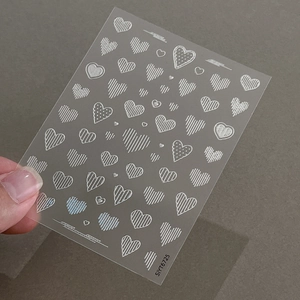 Relief heart line nail stickers with silver metallic finish and transparent adhesive back