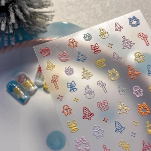 3D embossed Christmas nail art stickers featuring colorful gingerbread man and tree