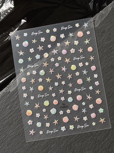 Details von Deep Sea Nagelaufklebern mit Laser-Muschel- und Seestern-Mustern