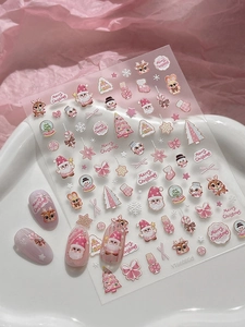 Detailed 5D embossed Christmas nail stickers with pink Santa and reindeer motifs