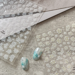 Minimalist white floral nail art stickers with 3D pearls and blue gradient design YT6223