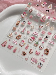 Detail of YT6608 pink Christmas nail stickers featuring Santa Claus and reindeer designs