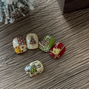 3D embossed Christmas nail art stickers featuring ginger bear and festive tree patterns