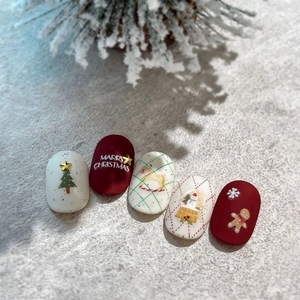 Christmas theme nail art stickers featuring Santa, snowflake designs, and matte red finish