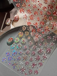 Macro shot of 3D firework nail stickers YT5034 and YT5035 with glitter texture