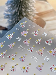 Détails d'autocollants nail art 5D avec sapins de Noël en relief et nœuds élégants