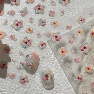 3D embossed floral nail stickers featuring colorful flowers and butterflies design