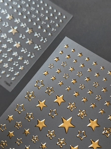 Détails de stickers 3D pour ongles avec étoiles dorées et argentées et nœuds