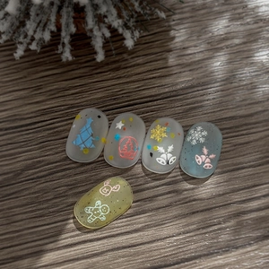 3D embossed Christmas nail stickers with colorful Santa, tree and snowflake patterns