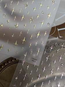 Detail of YT6495 nail art stickers with gold and pink four-pointed star glitter designs
