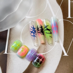 Y2K style coffin and square nail art stickers with colorful gradient tribal patterns