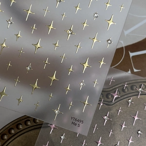 Sparkling gold and pink star nail stickers with rhinestones for elegant manicure decoration