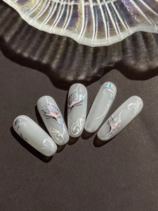 Detailed laser butterfly and floral embossed nail stickers on iridescent gradient base