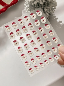 Macro de stickers 3D pour ongles Père Noël avec détails gaufrés rouges et blancs texturés