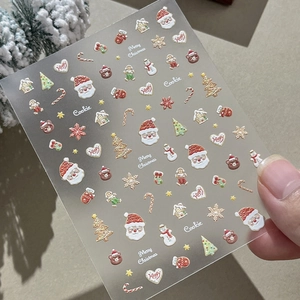 Cute Christmas nail art stickers featuring Santa Claus, gingerbread man and holiday motifs