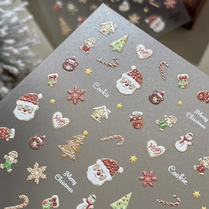 3D Christmas nail stickers with Santa, gingerbread man and tree patterns for holiday DIY art