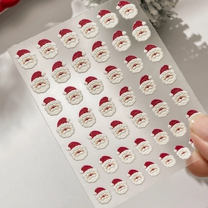 Stickers nail art 3D père Noël en relief avec des motifs de dessins animés festifs