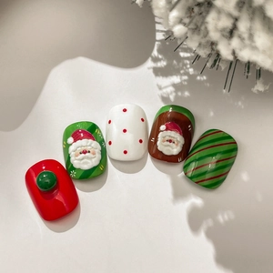 Stickers nail art Noël en relief 3D avec motifs Père Noël et décorations rouges festives