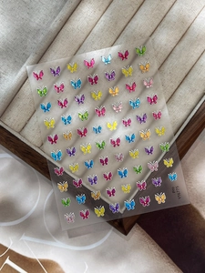 Vue détaillée des autocollants à ongles papillon Pro YT6775 avec des paillettes multicolores