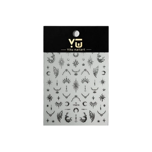 Metallic celestial nail art stickers featuring gold stars, moons and butterfly wings
