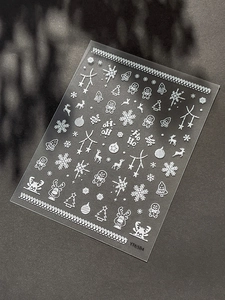 5D embossed Christmas nail stickers featuring white gingerbread man and snowflake patterns
