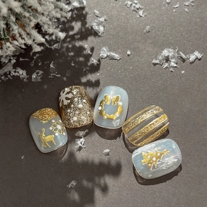 Golden Christmas tree nail art stickers with embossed deer and snowflake designs