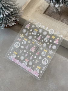 Detailed view of 5D embossed Christmas nail stickers with white snowflakes and pink trees