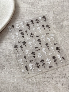 Detailed view of YT6864 relief rose nail art stickers with black and white floral motifs