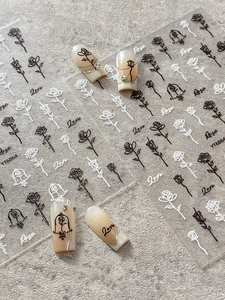 Detail of YT6864 embossed rose nail stickers with black and white floral patterns