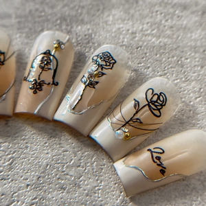 Relief rose nail stickers with pearls and love patterns on cream gradient nails