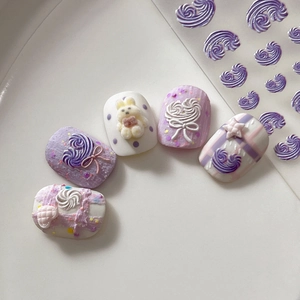 Pastel cream nail stickers with 3D flocking rabbit and bow accents on lilac nails