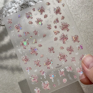 Autocollants ongles roses scintillants avec finition holographique et motifs de fleurs 3D