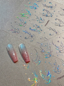 Macro detail of laser holographic star nail stickers with galaxy moon motifs