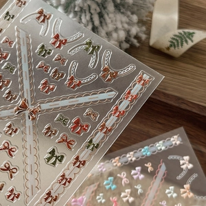 Stickers ongles Noël relief 3D avec motifs élégants de nœuds et dentelle fine