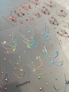 Detailed macro of laser silver star and curve line nail art stickers YT5655Pro