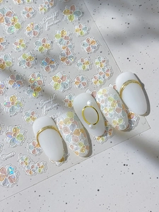 Detailed relief flower nail stickers with 5D texture and iridescent glitter finish
