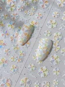 Detail view of 3D shell floral nail stickers with multi-color 5D embossed flower designs