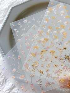 Detailed summer beach nail stickers featuring golden palm trees and birds on thin decals