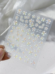 Macro detail of holographic shell-textured flower nail art stickers model YT5296