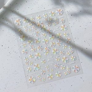 Exquisite floral nail art stickers with shell luster and sparkling holographic effect