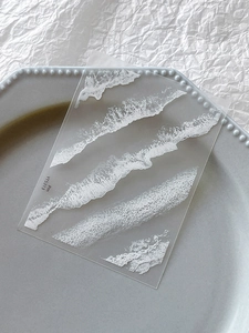 Macro view of white embossed wave texture on 3D PET nail art sticker decal