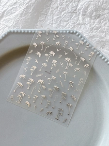 Silver embossed coconut tree nail stickers with summer beach themed lettering and birds