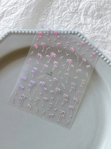 Detailed macro view of laser holographic palm tree nail art stickers model YT5146