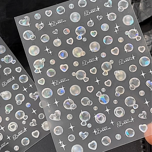 Autocollants ongles 3D holographiques effet bulles avec cœurs et étoiles sur feuilles transparentes