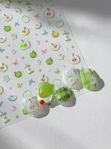 Detail of green apple nail art stickers with cute butterfly and star laser patterns
