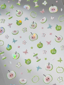 Holographic green apple nail stickers with sparkling stars and butterfly details