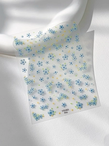 Detail of YT5383 Pro blue floral nail stickers with five-petal flowers on clear base