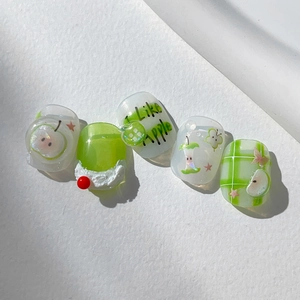 Cute green apple nail stickers featuring 3D fruit designs and stylish plaid patterns