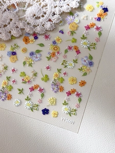 Detailed macro of YT5601 colorful 3D floral nail stickers with daisy and clover motifs