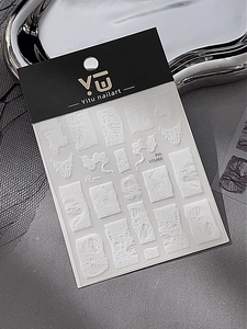 Detail of YT5466 white lace nail art stickers with abstract torn textures on silver tray